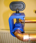 Emergency Pipe Repair Tool That Stops Leaks Fast In Seconds clamped on 15 mm copper pipe showing leak sealer application