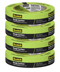 Stack of four rolls of rugged painter's tape for rough surfaces 1 inch by 60 yard green, sticks like a boss on brick stucco concrete.