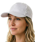 Hella Comfortable Anti Static Baseball Cap With Sturdy Hard Brim Legit Esd Safe Cleanroom Work Hat For Electronics Assembly Breathable Dust Free Cap White Stripe shown on a woman.