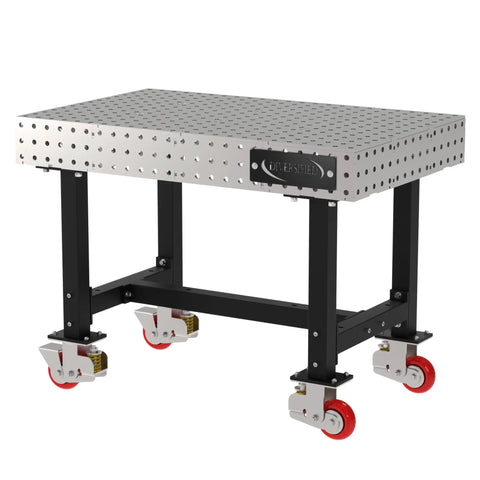 Shop Ready Heavy Duty Welding Fixture Table With Precision Laser Cut Grid Holes And Smooth Rolling Locking Casters For Zero Fuss Fabrication Rigs 48X30X36 with sturdy steel frame and locking casters.