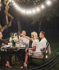 Outdoor dining scene using 300 Ft Outdoor Indoor Extension Cord With 3 Outlets Heavy Duty 16 Gauge 3 Conductor