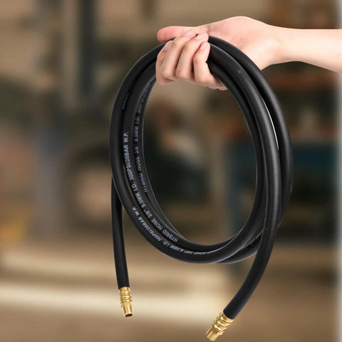 Built Like A Tank Twin Pack Air Compressor Lead Hose 3/8 X 10 Feet held in hand, featuring solid brass fittings and flexible design.
