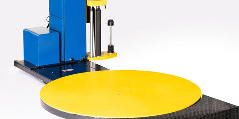 Close-up of Heavy Duty Semi Auto Pallet Wrapper With Built In Digital Scale, featuring yellow rotating platform for 5000 lb loads.