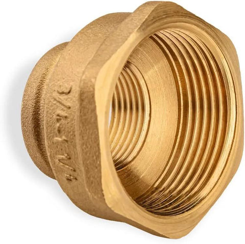 Brass pipe reducing coupling with female threads on both ends, 3/4 in to 1-1/4 in, for plumbing.