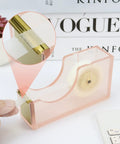 Pink Stapler And Tape Dispenser Set With Acrylic Desktop Organizer Dope Desk Setup Kit includes pink acrylic tape dispenser in use