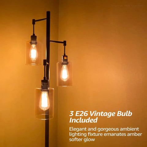 Three-Head Industrial Farmhouse Floor Lamp With Amber Glass Shades glowing warmly against a yellow wall.