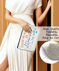 Woman holding Funny Travel Makeup Bag For Women, Multiuse Cosmetic Case And Toiletry Organizer against wall, close-up of fabric