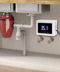 Wall Mounted Instant Electric Tankless Water Heater With Digital Display For Fast Hot Water And Precise Temp Control No Cold Shock Instead It Hits Different For Winter Showers Smooth installed under a sink with plumbing.