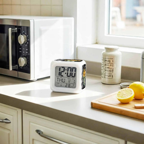 Solid Build Cube Digital Alarm Clock With Seven Color Led Night Light And Easy Peasy Snooze on kitchen counter, showing time and temperature.