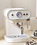 Compact White Coffee Maker And Mini Espresso Brewer With Auto Steam Frother, Heavy Duty Countertop Appliance close-up of controls and spout.