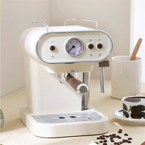 Compact White Coffee Maker And Mini Espresso Brewer With Auto Steam Frother, Heavy Duty Countertop Appliance close-up of controls and spout.