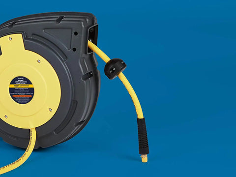 Close-up of Retractable Air Tool Hose Reel With Polypropylene Case showing 3/8 inch by 50-foot hybrid polymer hose