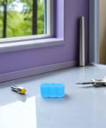 20 Pcs Rubber Drawer Track Stops With Silent Glide for Easy DIY Installation blue stopper, bolt, and screwdriver on desk