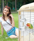 Automatic Bird Water Feeder With Secure Anti Tip Bowl For Small Cages hanging on a birdcage with a parakeet.