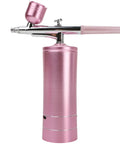 Deep Hydration Oxygen Facial Machine Handheld High Pressure Mist Sprayer For Skin Rejuvenation in pink, side view