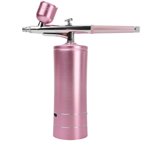 Deep Hydration Oxygen Facial Machine Handheld High Pressure Mist Sprayer For Skin Rejuvenation in pink, side view