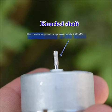 Close-up of knurled shaft on Tiny Powerhouse Mini DC Motor For DIY Projects 32mm Round Spindle With Carbon Brush 5V 6V 7.4V Compatible 12600 RPM High Speed Micro Motor Ideal For Hobby Toys Fans And Model RC Projects.