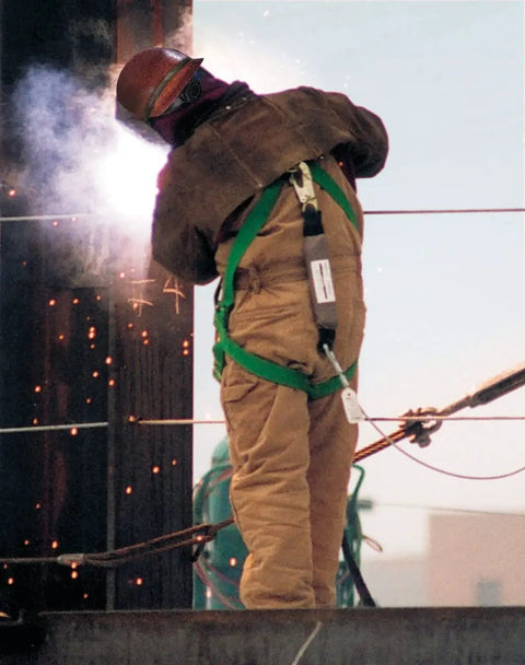 Worker welding wearing Skullgard Cap Style Safety Hard Hat With Staz On Pinlock Suspension Non Slotted Cap Made Of Phenolic Resin
