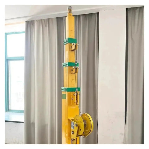 Top Shelf Manual Telescopic Hand Crank Lifting Pole Offering No Sweat Height Adjustment Up To Nine Meters, yellow with crank mechanism.