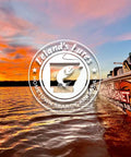 Leland's Lures branding on a fishing boat at sunset over calm water