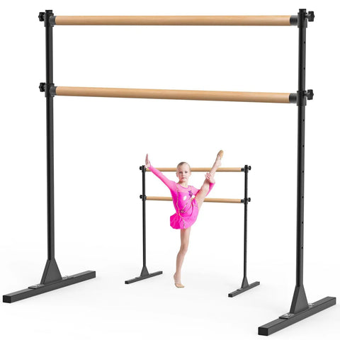 4 Foot Height Adjustable Freestanding Wooden Ballet Barre With Double Bar Heavy Duty For Your Home Gym Dance Barre Portable 350 Lb Capacity displayed with child stretching