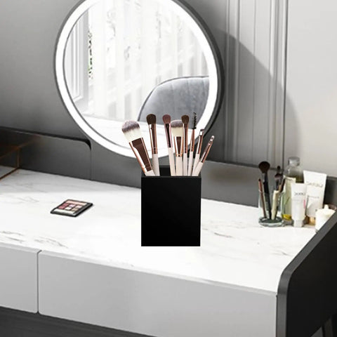 Black acrylic pen and pencil holder set with makeup brushes placed on a vanity desk. Two Pack Acrylic Pen And Pencil Holder Set For Desk Organization Black Makeup Brush Holder Cup Storage Office Desktop Organizer Keeps Pens Pencils And Makeup Brushes Neatly Separated.