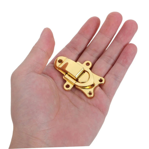 Chic 2 Pcs Antique Golden Zinc Alloy Toggle Lock Buckle For Wooden Jewelry Box And Tool Case With Classic Retro Latch Hardware in hand.