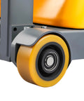 Close-up of wheel on High Capacity 2200lb Full Electric Straddle Fork Stacker With Counterbalanced Design, showcasing durable orange material.
