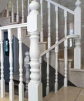 Rock Solid White Wooden Baluster Posts For Staircase Deck And Porch, No Sweat Poplar Wood Spindle Assembly, Sweet Finished Interior Railing Guard, Built Tough Home Fix Essential, 33 Inch Tall, showcasing balusters on stairs.