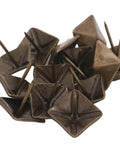 Top Shelf Antiqued Brass Upholstery Nails With Dang Sharp Square Cone Heads Heavy Duty Furniture Tacks Pack Of Thirty close-up of nails