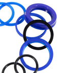 Hydraulic cylinder seal kit with blue and black rubber O-rings in assorted sizes.