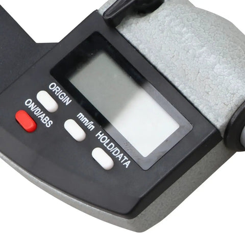 Close-up of digital display on Digital Ball And Tube Micrometer With Spherical Anvil, showing measurement buttons