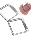 Push Button Safety Cover 2 Pack Sturdy Plastic Protection Cap for electronics, clear design, displayed in hand for size reference