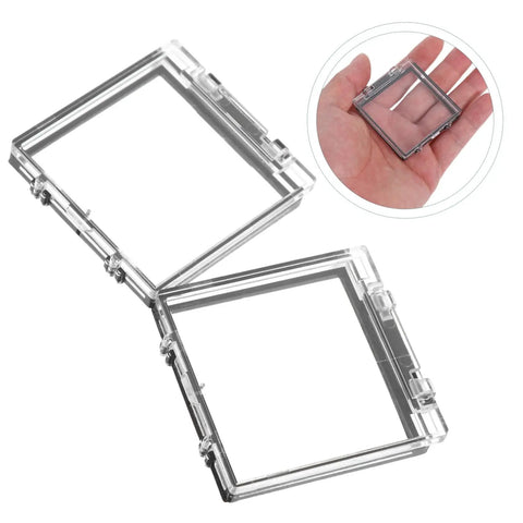 Push Button Safety Cover 2 Pack Sturdy Plastic Protection Cap for electronics, clear design, displayed in hand for size reference