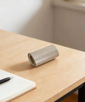 Roll of mica paper sheet on table, size 13x4 inches, pro grade high temperature insulation for heat guns and electrical insulation.