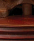 Close-up of red finish wood finial on Vintage Inspired Butter Churn Lamp Replica With Hand Cranked Mechanism