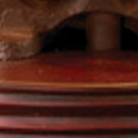 Close-up of red finish wood finial on Vintage Inspired Butter Churn Lamp Replica With Hand Cranked Mechanism