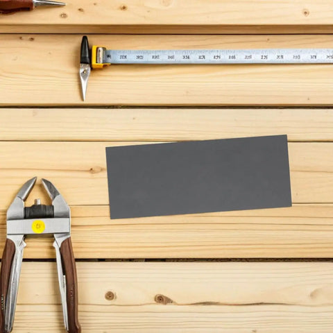 Grab A Pro Level 21pcs Emery Sandpaper Sheet Set For Wet Or Dry Grit Sanding On Metal And Wood Surfaces To Get That Smooth Polished Finish Fast And Easy Like A Boss on wooden workbench.