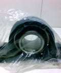 Single UCPX18 pillow block unit, 90 mm bore, 101.6 mm center, 104 mm bearing width, 206 mm overall, cast iron housing, wrapped in plastic