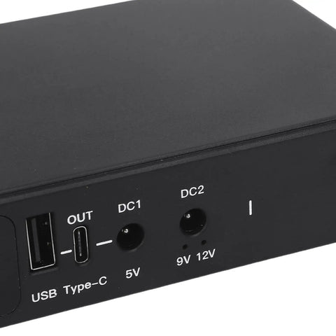 Heavy Duty UPS Power Supply With 18000mAh Battery Backup showing input and output ports, USB Type-C, and DC connectors.