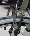 Rock Solid Aluminum Alloy Brake Boosters With Mounting Screws For V Brake Mountain Bikes heavy duty black finish mounted on bike.