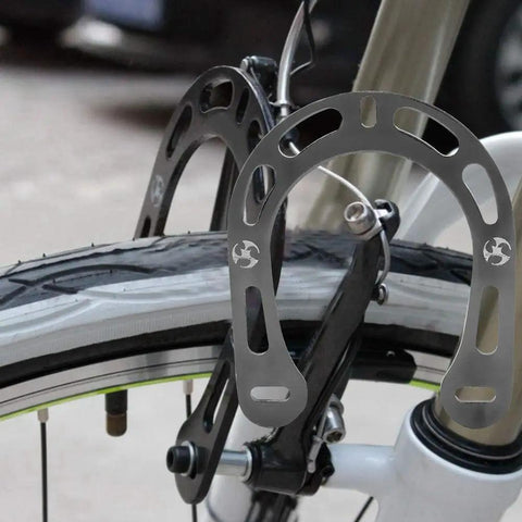 Rock Solid Aluminum Alloy Brake Boosters With Mounting Screws For V Brake Mountain Bikes heavy duty black finish mounted on bike.
