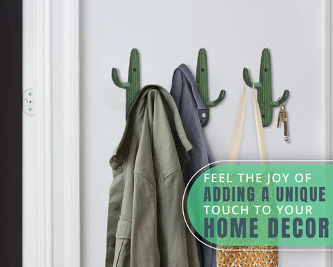 Roll With That Chill Southwest Vibe Using This Set Of Three Rustic Green Cast Iron Cactus Wall Hooks holding a jacket and bag.