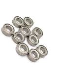 10 Pack Metal Upgrade Bearings 4x7x2mm For RC Crawlers shown scattered; precision machined inner and outer rings visible