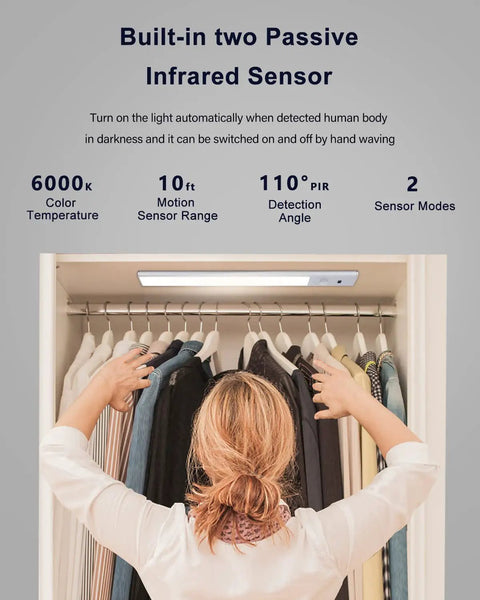 Person installing 30 LED Motion Sensor Under Cabinet Light With Dimmable USB Rechargeable Night Lighting in wardrobe