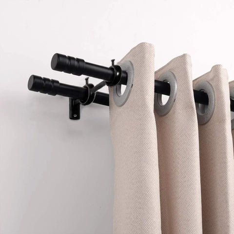 Installed view of the Three Piece Adjustable Curtain Rod Brackets Set With Double Wall Mount Holders holding beige curtains, durable black finish.