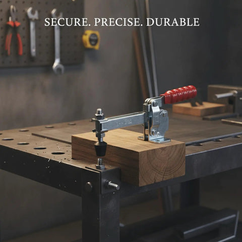 Badass Heavy Duty Iron Toggle Clamp For Woodworking Jigs And Welding Fixtures attached to a wooden block on a workbench.
