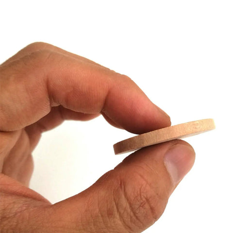 Hand holding a Solid Quality Natural Wood Round Unfinished Craft Disc, ideal for DIY projects and rustic decor.