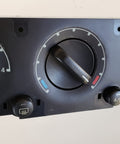 Ford Black HVAC Temperature Control Panel With Push Button Rotary Actuator And Manual Operation Genuine Ford Part Replacement Climate Control Module For Ford Vehicles 1L2Z19980AA showing dials and buttons