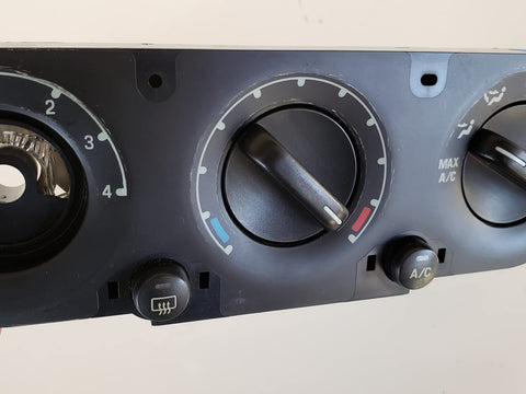 Ford Black HVAC Temperature Control Panel With Push Button Rotary Actuator And Manual Operation Genuine Ford Part Replacement Climate Control Module For Ford Vehicles 1L2Z19980AA showing dials and buttons